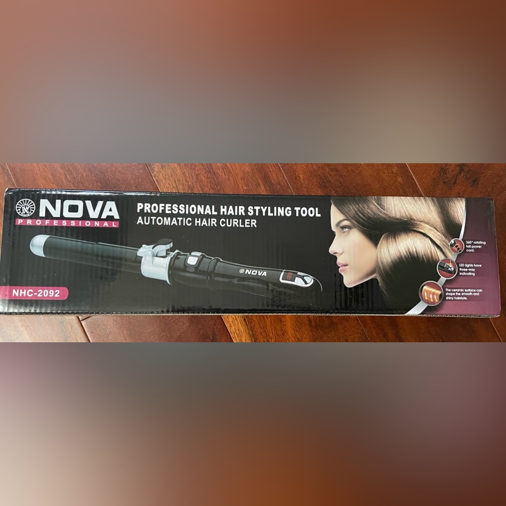 Nova automatic hair curler. Unopened.